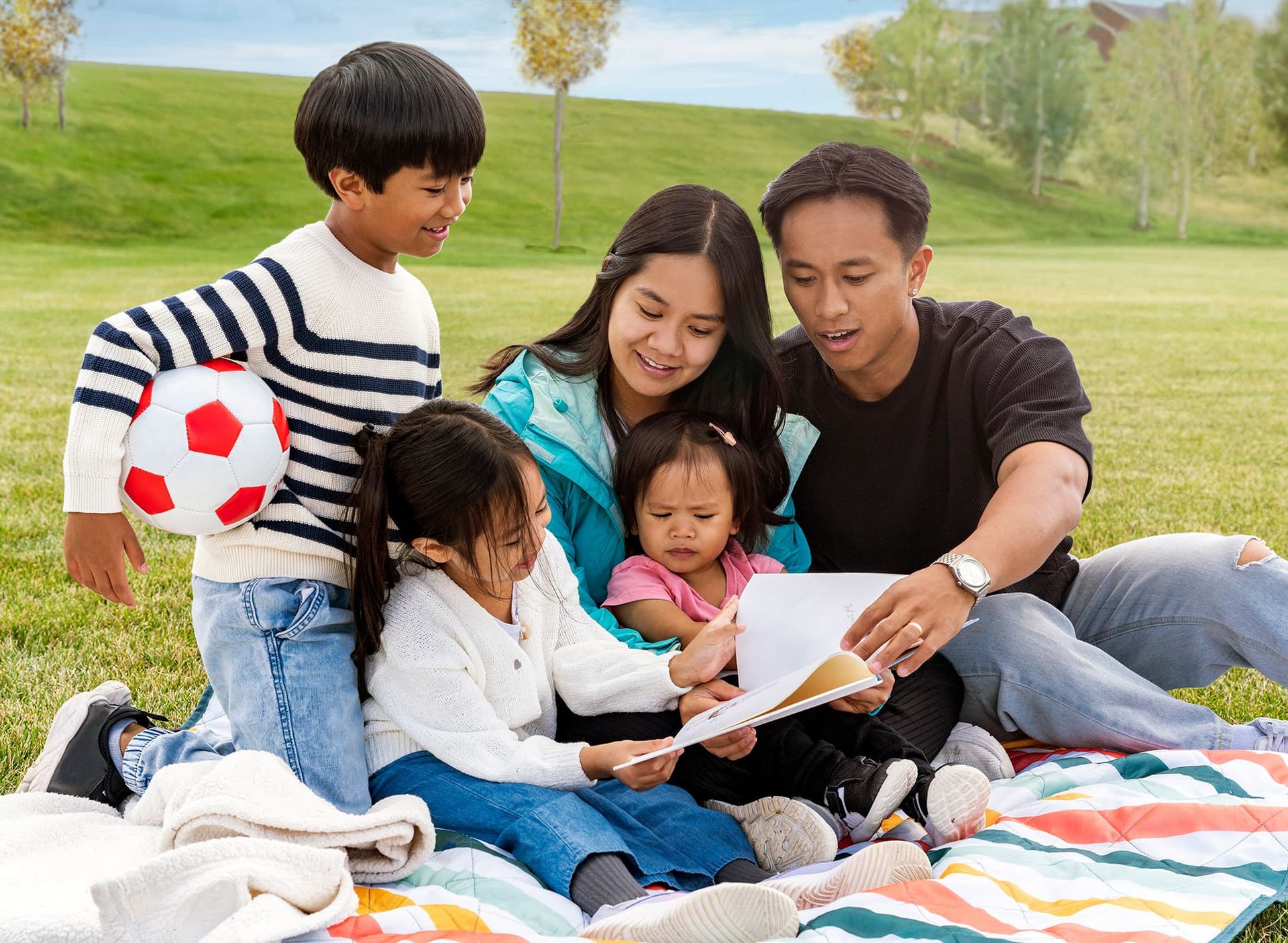 Young family enjoying the park in Hotchkiss.