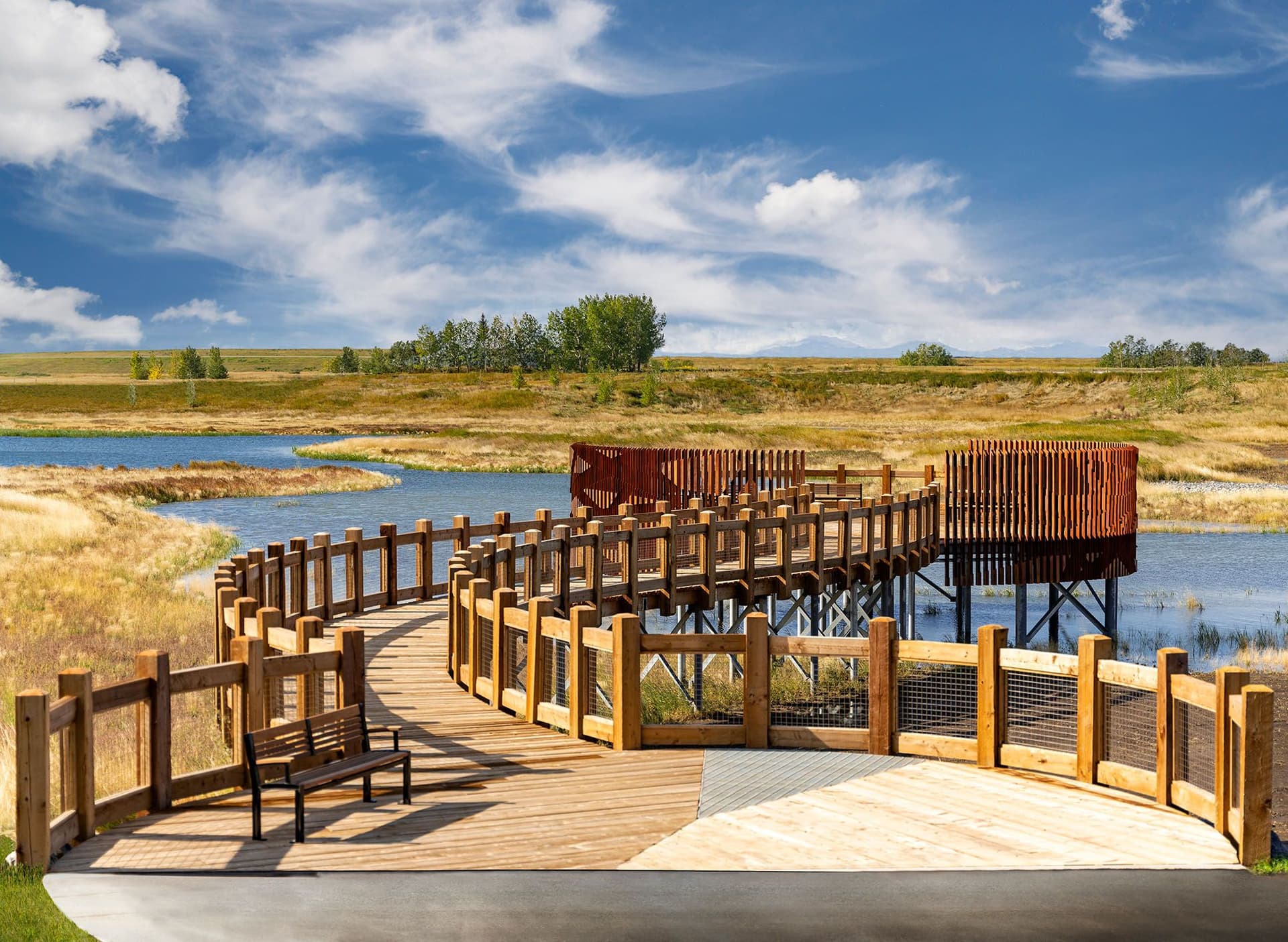 A unique boardwalk extends out over water at the Hotchkiss Wetlands.